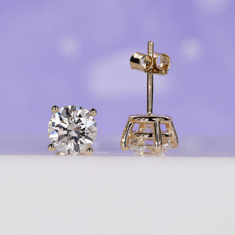 Comfortable push back earrings featuring round cut diamond earrings.