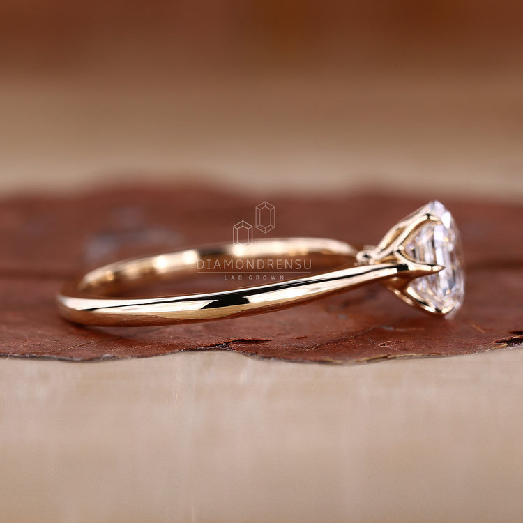 Claw Prongs securely hold the hexagon diamond in place.