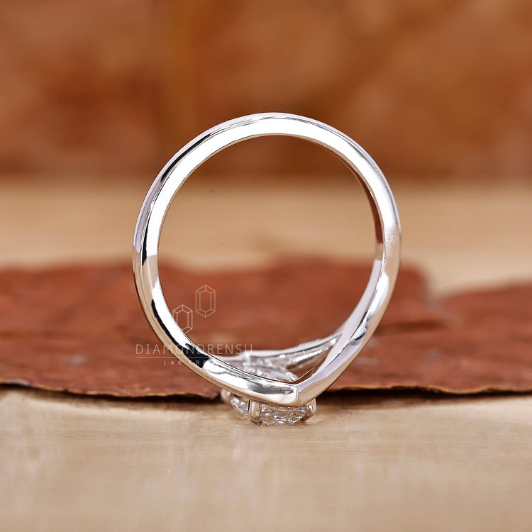 Claw Prongs holding the marquise diamond securely in place.