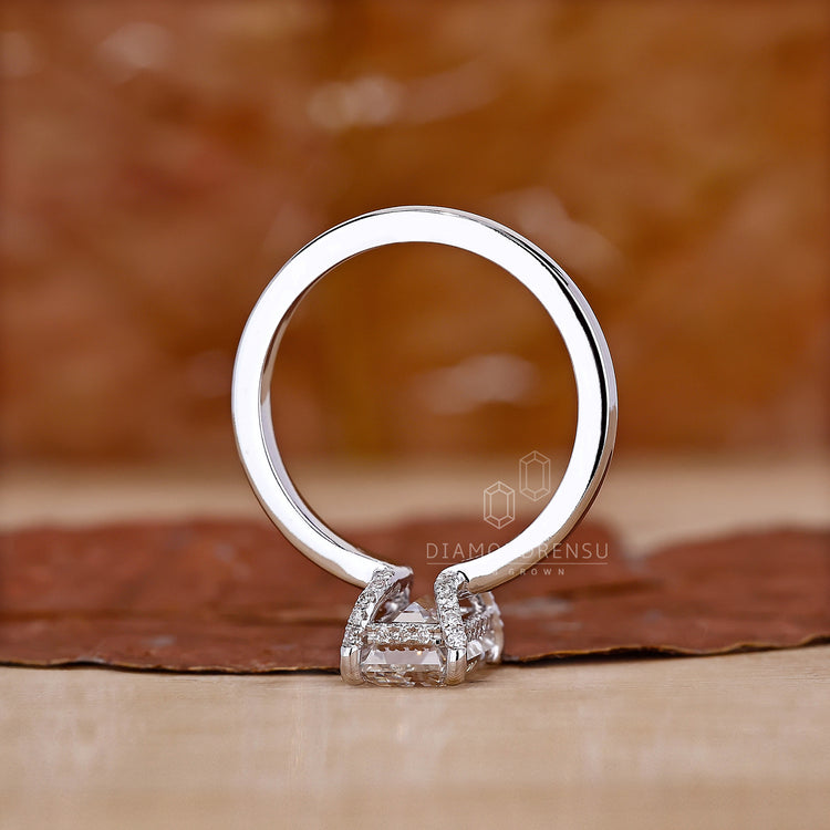 Diamond Prong Setting used to accentuate the hidden halo design.