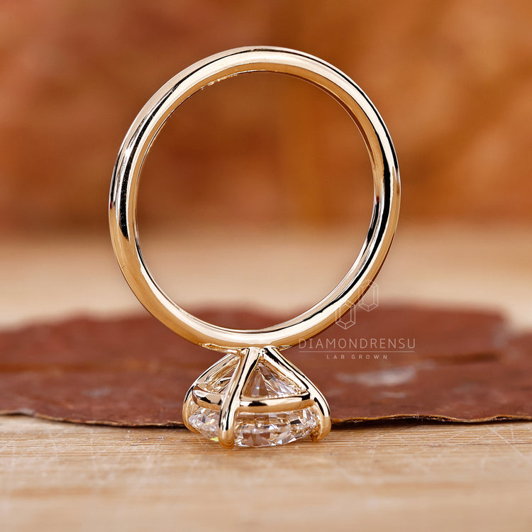 Solitaire Diamond Ring with secure 4 prong claw setting.