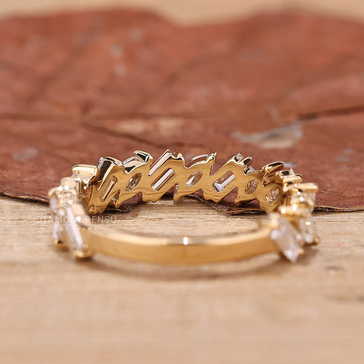 Womens Yellow Gold Wedding Band with intricate details.