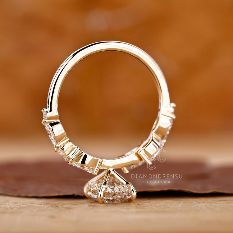 Round and marquise diamond ring with a 4 prong setting for durability.