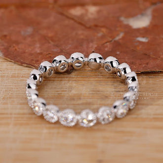 Round Diamond Wedding Band in a classic bezel setting.