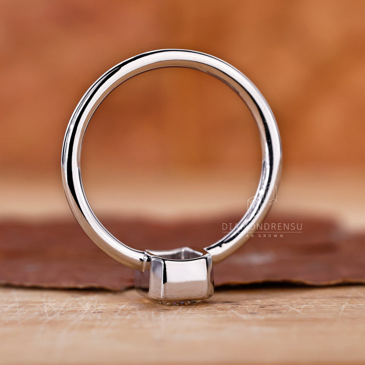 White Gold Engagement Ring with a beautiful emerald cut diamond.