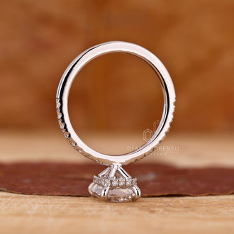 Round Cut Diamond Ring with stunning white gold accents.