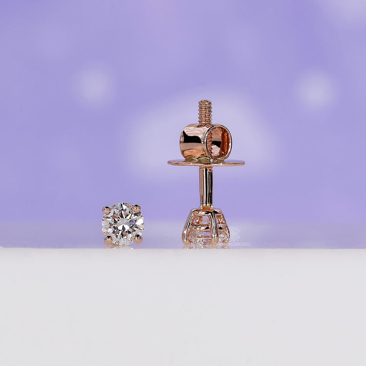 Round stud earring featuring rose gold for a timeless look.
