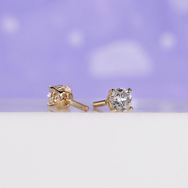 Timeless gold diamond earrings perfect for any occasion.