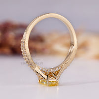 Yellow gold engagement ring featuring a radiant cut diamond for elegance.