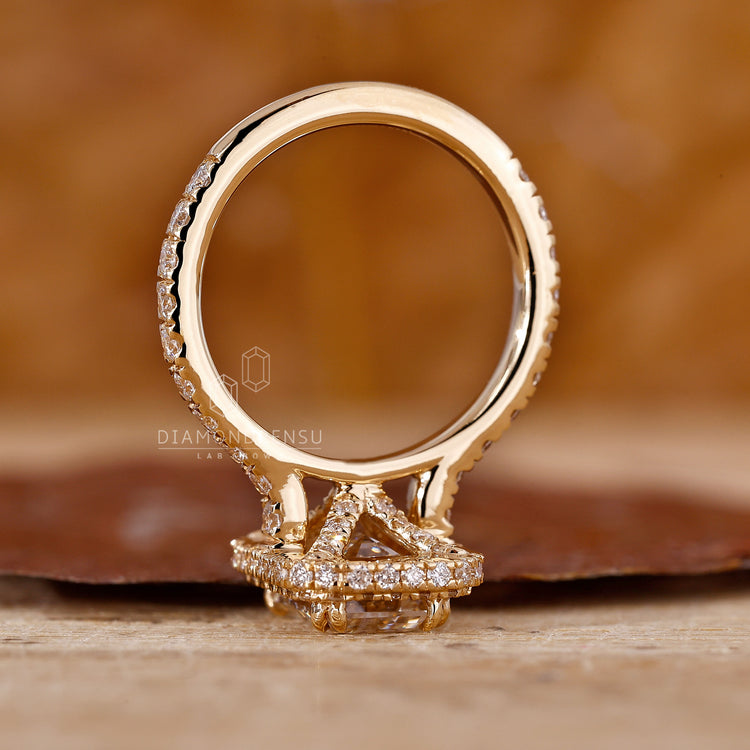 Cathedral setting emerald halo engagement ring.