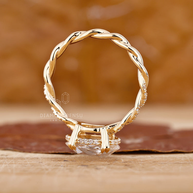 Oval and round cut diamond ring designed for elegance and sophistication.