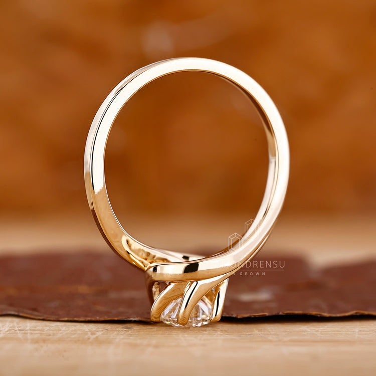 Handmade jewelry in bypass ring setting style.