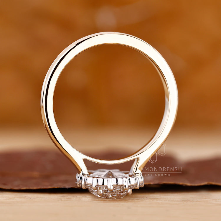 Handmade jewelry piece with a round diamond in cathedral setting from Diamondrensu