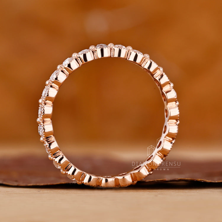 Rose gold milgrain diamond wedding band.