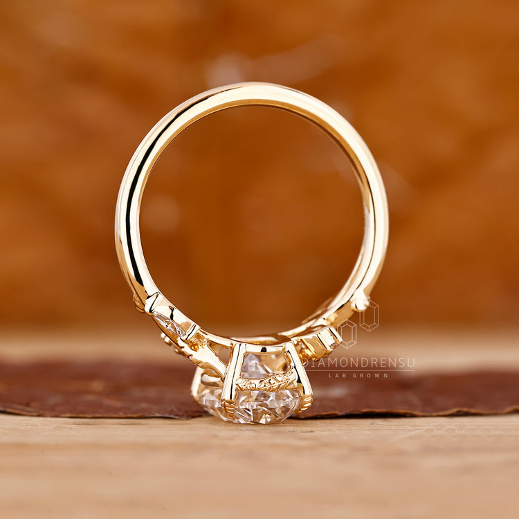 Lab grown oval diamond ring in yellow gold.