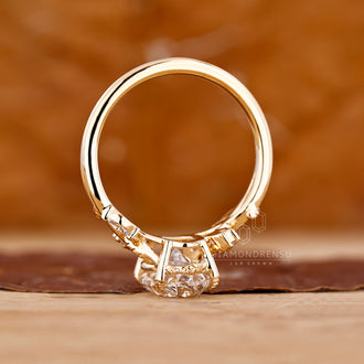 Lab grown oval diamond ring in yellow gold.