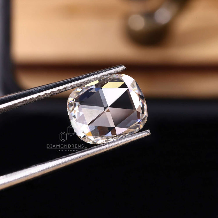 Cushion Cut Diamond with antique rose cut faceting.