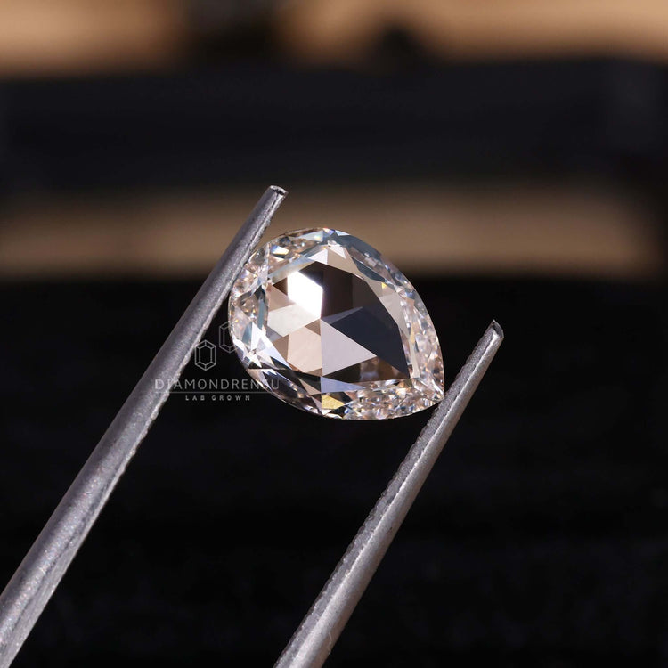 Lab grown loose diamond featured in pear rose cut for solitaire settings.