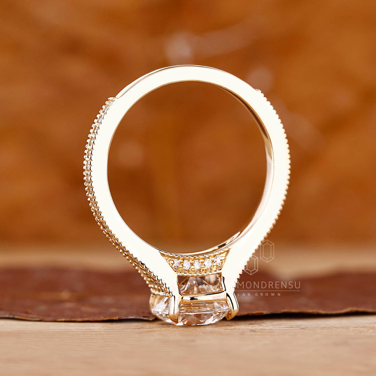 Handmade ring with tapered pave diamonds.
