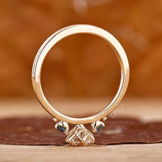 Yellow gold engagement ring features 6 prong setting.