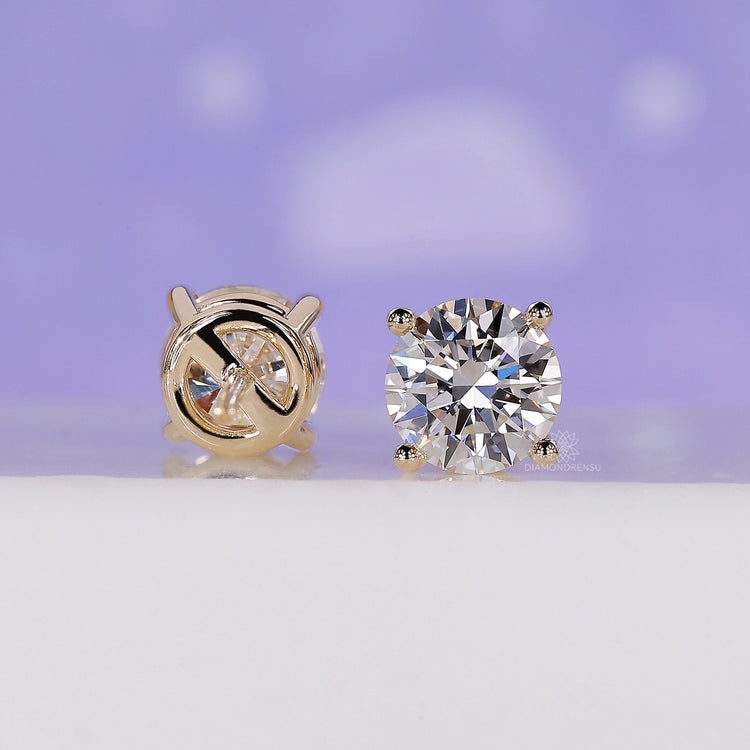 Luxurious gold diamond earrings to elevate your look.
