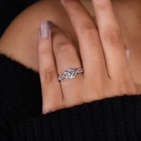 Twisted Halo Engagement Ring with intricate diamond detailing.