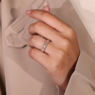 Asscher cut diamond band with sleek design.