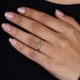 White Gold Ring with a pear shaped diamond for a luxurious finish.