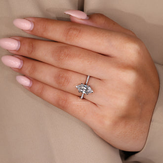 4 claw prong set marquise diamond ring with V prong.