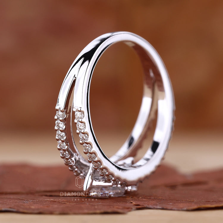 Prong setting ring with a brilliant diamond centerpiece.