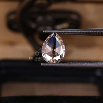 Pear rose cut diamond designed as a lab grown diamond for custom jewelry.