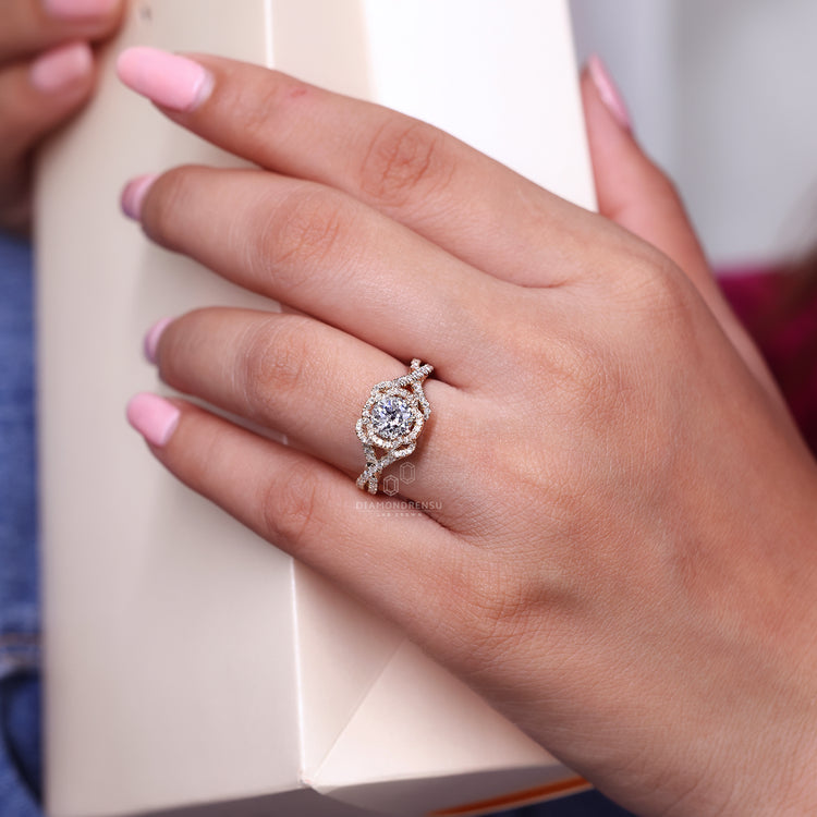 Yellow gold engagement ring with twisted pave and milgrain design.