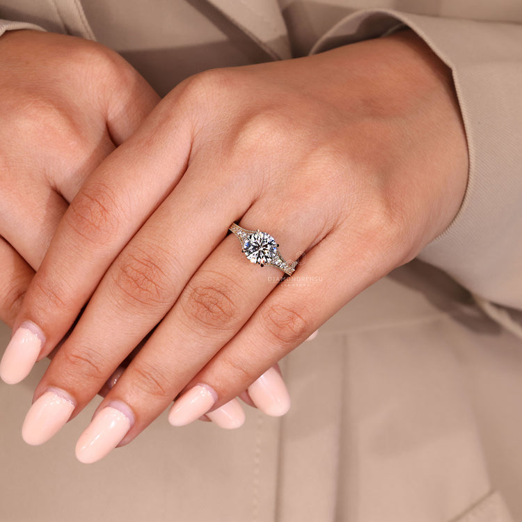 Custom engagement ring featuring bridge accent.