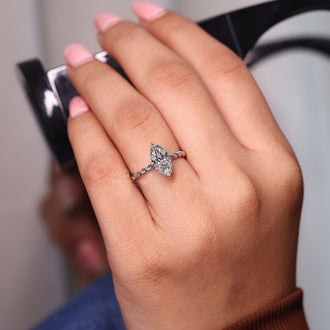 Solitaire diamond ring with a clean and simple design, perfect for any occasion.