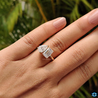 Moissanite engagement ring with a prong setting.