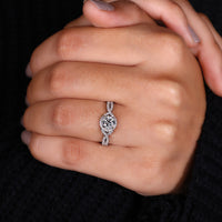 Round Diamond Engagement Ring in a twisted halo design.