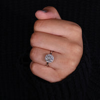 Cushion Cut Ring with a luxurious halo diamond setting.