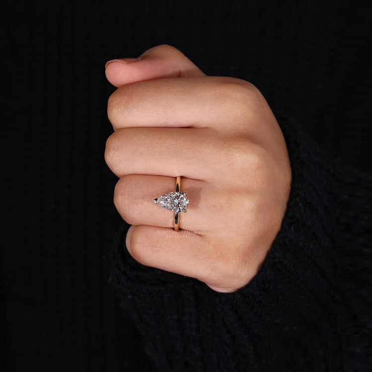 Buy lab-grown diamond ring with a pear-shaped stone for an ethical choice.