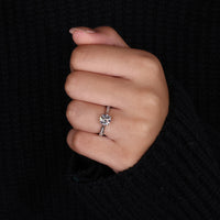 Cathedral Setting Ring with a sparkling round diamond center.