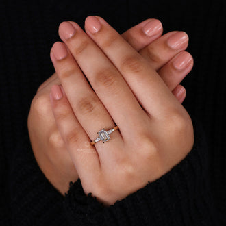 Claw Prong Setting used for a secure and timeless emerald cut ring.