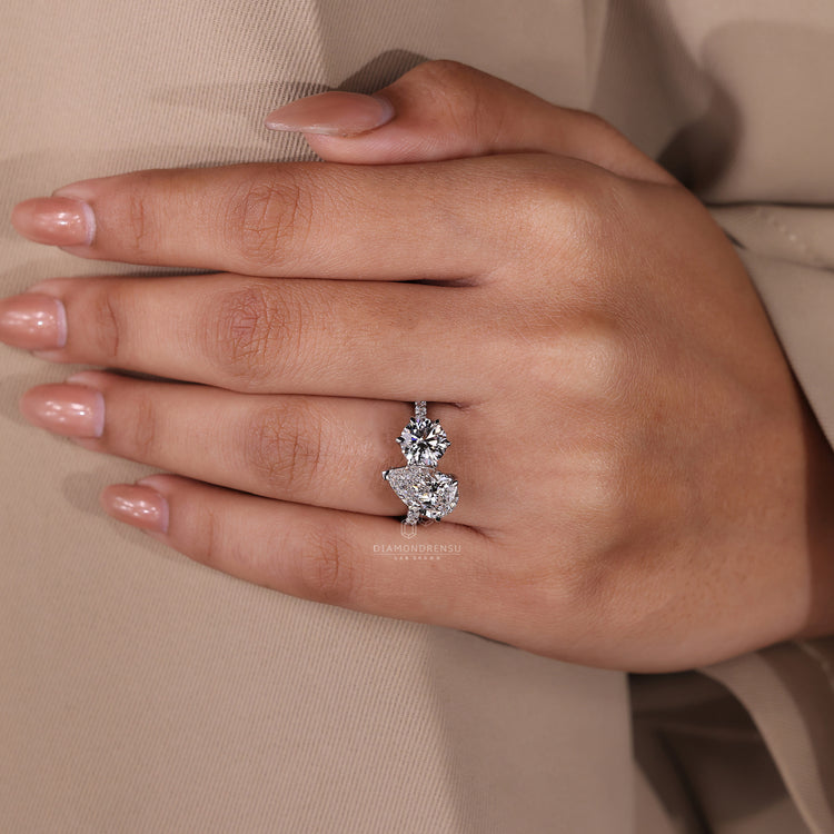 Diamondrensu engagement ring featuring white gold ring with round diamonds.