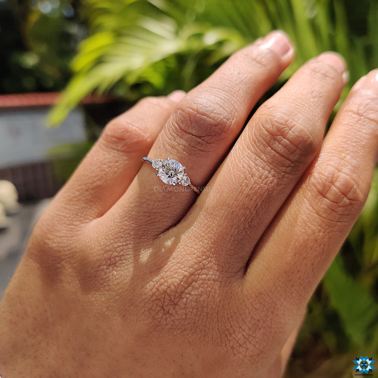 Diamondrensu round cut engagement ring handcrafted in white gold.