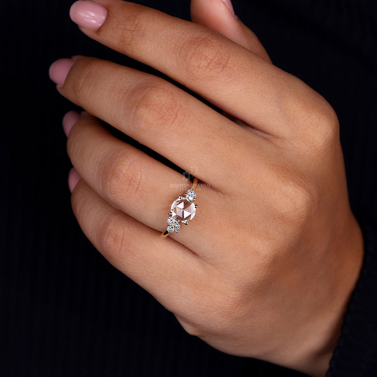 Marquise Side Stone Ring with elegant diamond accents.