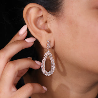 Baguette and round diamond cluster drop earrings in rose gold