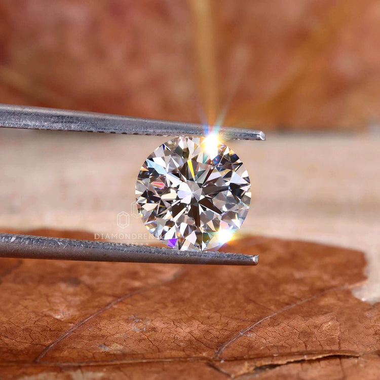 Round cut 2 carat diamond fits beautifully in handmade pendants.