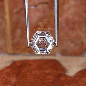 This antique cut lab grown diamond features a unique hexagon step cut.
