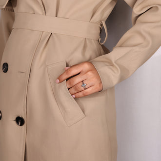 Lab grown diamond marquise and round three stone engagement ring.