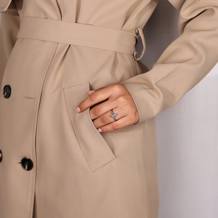 Lab grown diamond marquise and round three stone engagement ring.