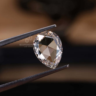 Buy loose lab grown diamonds in 1.21 carat pear rose cut options.