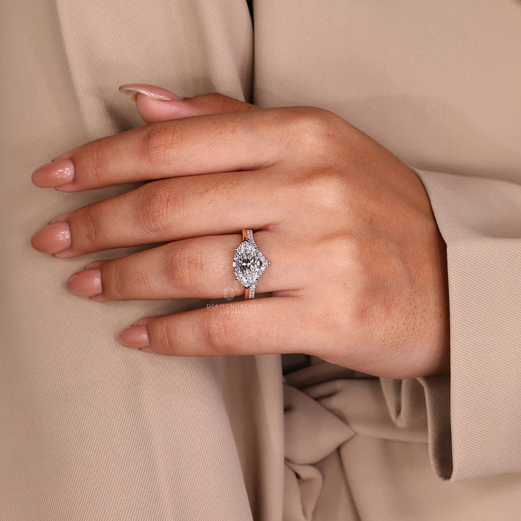 Marquise cut engagement ring featuring a brilliant diamond centrepiece.